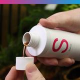 NT Labs Satus Filter Start bottle being poured for aquarium biofilter enhancement