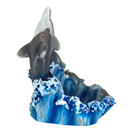 Colorful Playing Dolphins Aquarium Ornament with dolphins leaping from a sculpted wave, ideal for home decor or aquariums.
