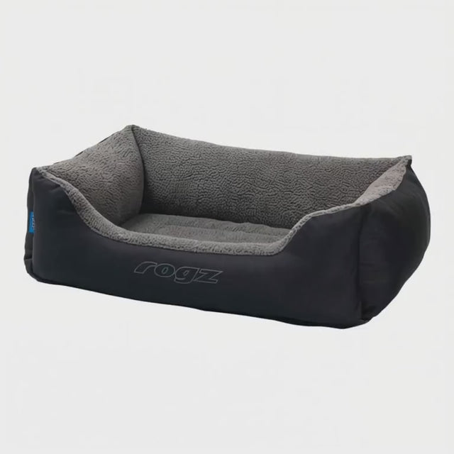 Rogz Outdoor Walled Dog Bed with side bolsters in gray and black, designed for comfort and durability.
