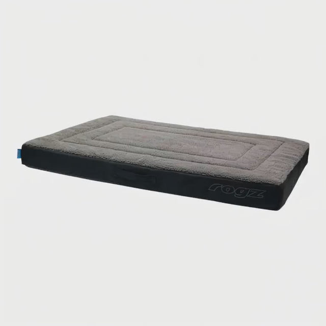 Rogz Outdoor Flat Dog Bed in gray, designed for comfort and durability for outdoor adventures.