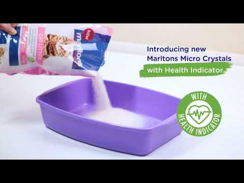 Marltons Micro Crystal Cat Litter with Health Indicator being poured into a litter box.