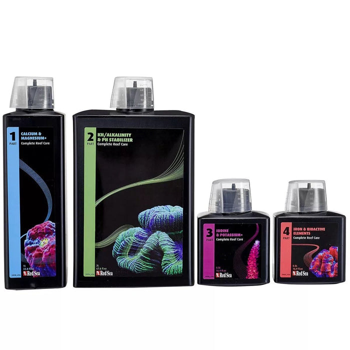 Red Sea 4-Part Complete Reef Care Dosing System featuring bottles for calcium, alkalinity, and trace elements for coral growth.