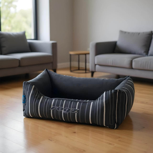 Rogz Graphix Walled Dog Bed in stylish black and gray stripes, perfect for pets to lounge and nap comfortably.