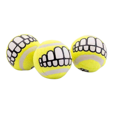Rogz Grinz Dog Toy 3 Pack Tennis Balls in bright yellow with cartoon teeth designs, perfect for fetch and outdoor play.