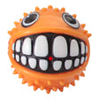Rogz Grinz Fetch Puffer Fish Toy for dogs, orange spiky squeaky fetch ball with playful Grinz smile design.
