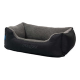 Rogz Outdoor Walled Dog Bed in black with cozy gray lining, designed for comfort and durability for outdoor adventures.