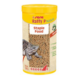 Sera Raffy P Nature staple food for terrapins in a yellow container with granules for carnivorous reptiles.