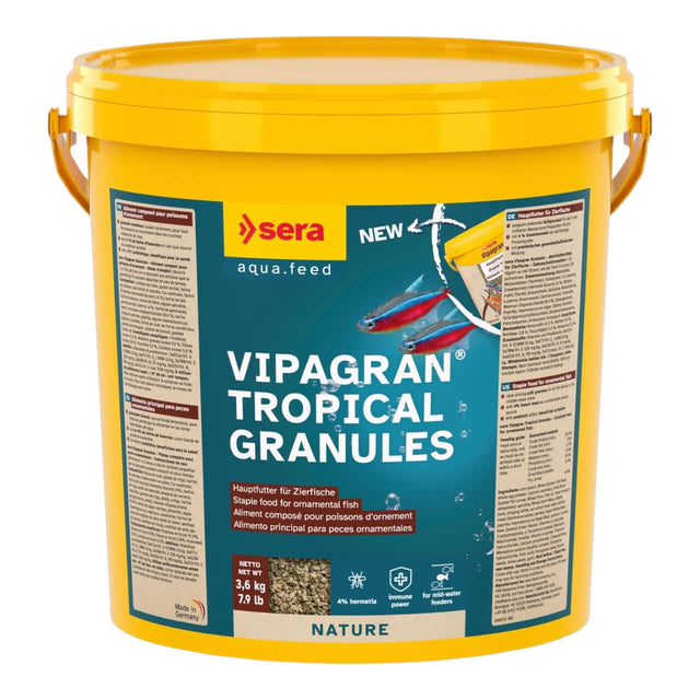 Sera Vipagran granules in yellow bucket, staple food for ornamental fish, supports healthy growth and development.