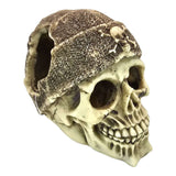 Skull with brown beanie aquarium ornament featuring detailed eye sockets, aged cream finish, and knit-style beanie.
