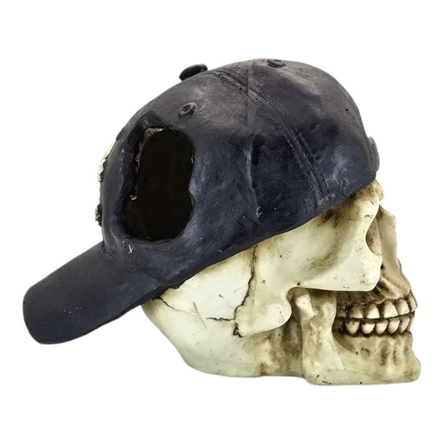 Detailed skull ornament with a black baseball cap for aquariums, featuring realistic bone texture and design.