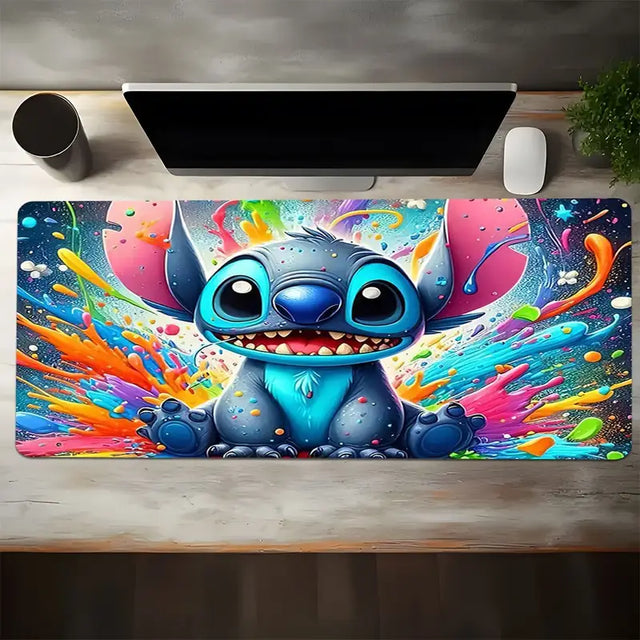 Colorful Stitch mouse pad 80x40cm with vibrant paint splatter background, perfect for a playful workspace.