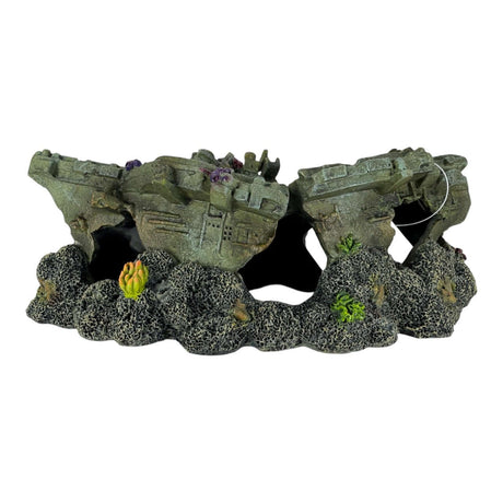 Sunken aircraft carrier aquarium ornament with textured stone-like details and aquatic plants, perfect for fish tanks.