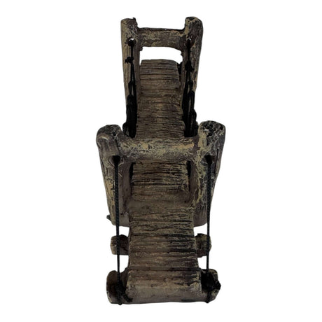 Suspension bridge aquarium ornament with textured support posts, ideal for miniature landscapes in aquariums or terrariums.