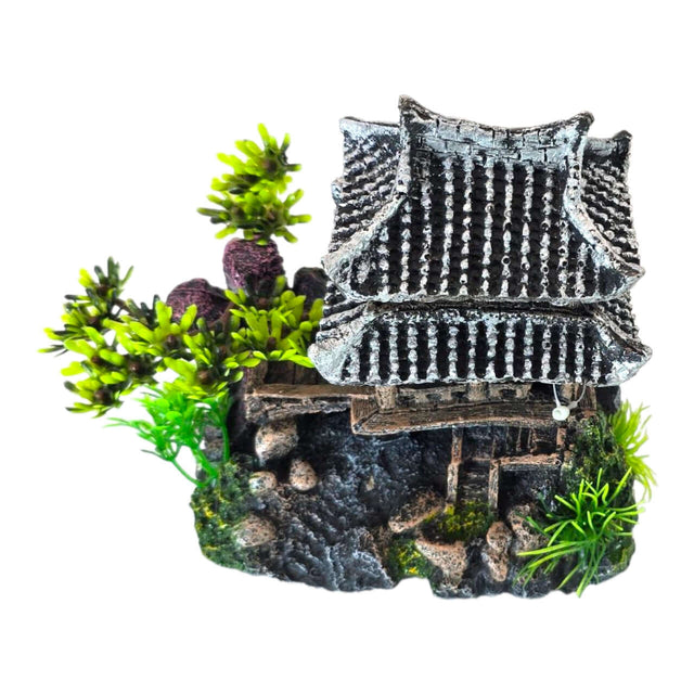 Temple on Rocks Aquarium Ornament with Asian-style pagoda and greenery, perfect for aquariums or terrariums.