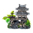 Temple on Rocks Aquarium Ornament featuring a detailed Asian-style pagoda on rocky base with green plants.