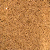 Tetra Pond Koi Sticks close-up, nutrient-rich fish food for Koi, promoting growth and vitality.