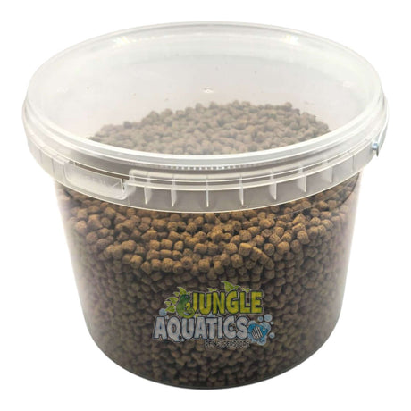 Tilapia Fish Food in a clear container enhancing fish nutrient intake and promoting health.