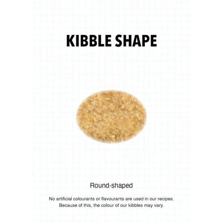Round-shaped kibble sample for Ultra Dog premium puppy dry food, showcasing natural color without artificial additives.