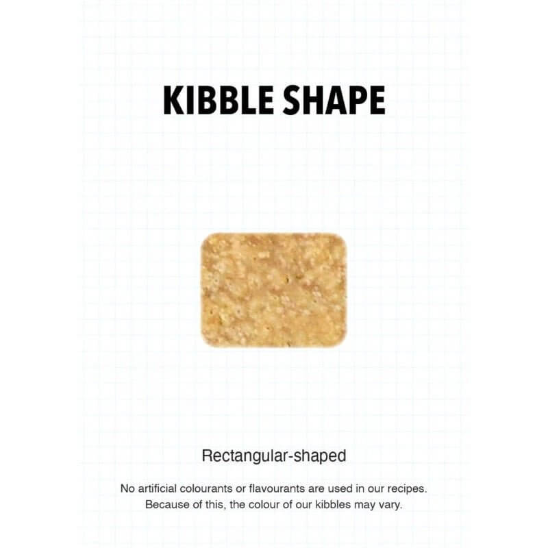 Rectangular-shaped kibble for Ultra Dog Superwoof dog food, highlighting natural ingredients and variations in color.