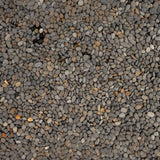 Natural UNS Controsand Kona substrate for aquariums, featuring a blend of smooth gray and brown granules.