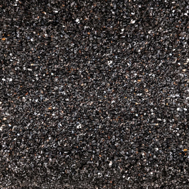 Close-up of UNS Controsand Maui, a natural black substrate for freshwater aquariums and terrariums.