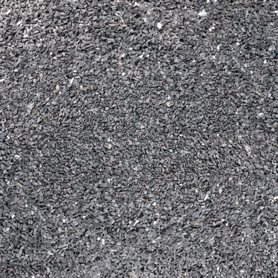 Close-up of UNS Controsand Maui natural substrate, ideal for freshwater aquariums and terrariums, safe for aquatic life.
