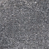 Close-up of UNS Controsand Maui natural substrate, ideal for freshwater aquariums and terrariums, safe for aquatic life.