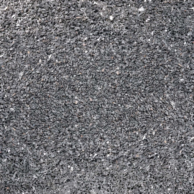 Close-up of UNS Controsand Maui natural substrate, ideal for freshwater aquariums and terrariums, safe for aquatic life.