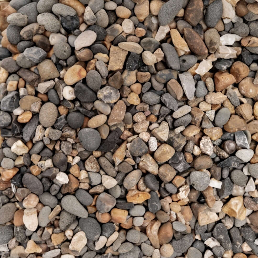 Natural substrate blend of various stones and granules for aquariums and terrariums, safe for aquatic life.