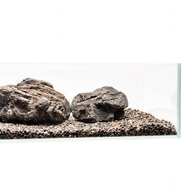Aquarium with natural stones and fine substrate, ideal for aquascaping with UNS Controsand Santa Fe.