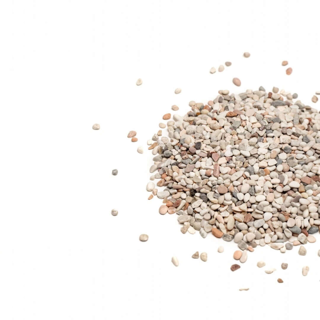 Natural substrate blend for freshwater aquariums, safe for fish and reptiles, with various tones and granule sizes.