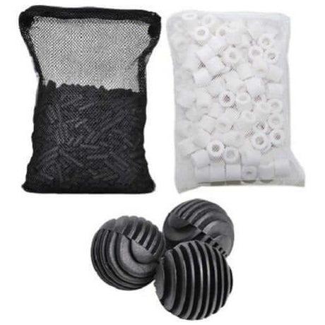 Assorted aquarium filter media including black bag of pellets, white cylindrical media, and black spherical filter balls.