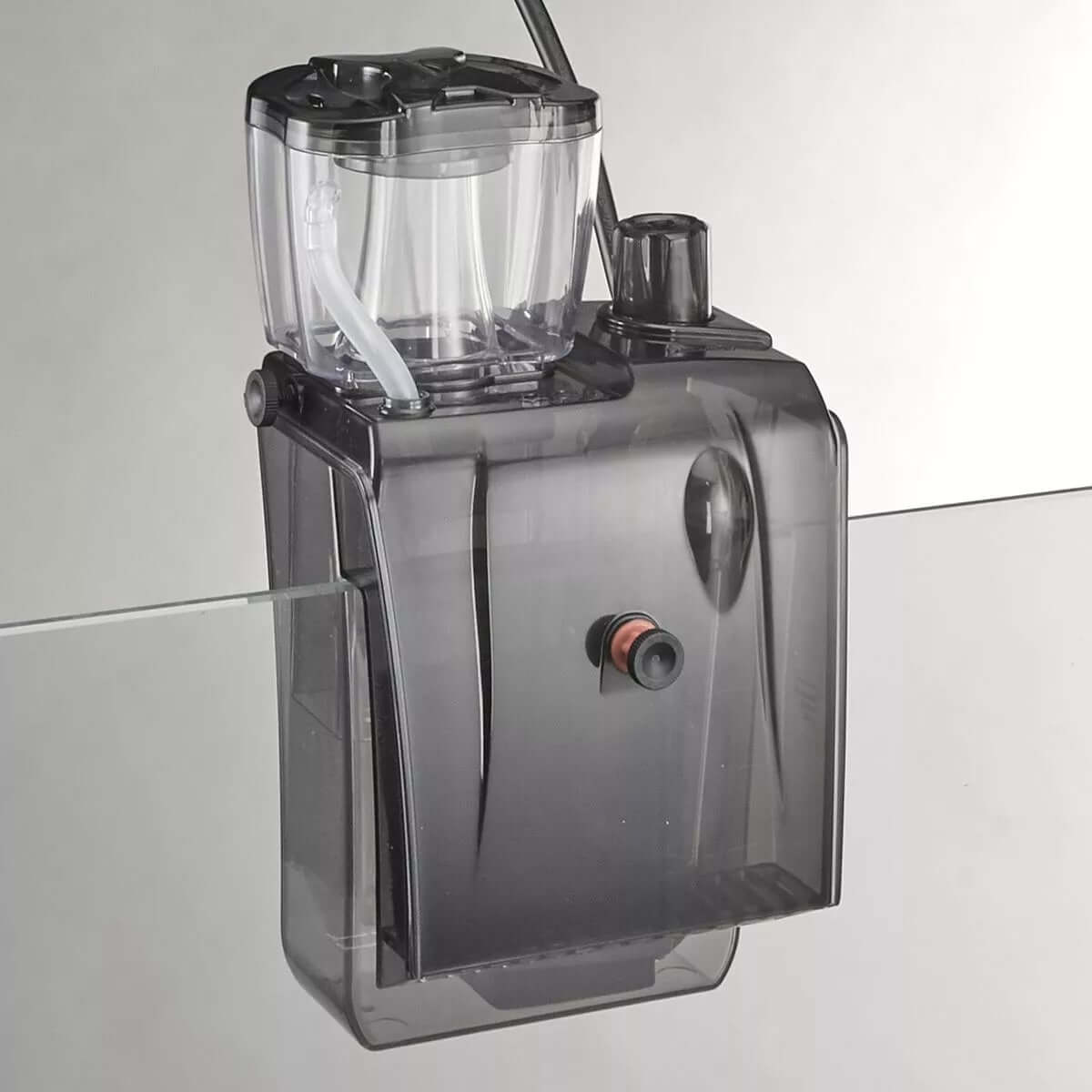 Bubble Magus QQ1 External HOB Protein Skimmer mounted on an aquarium, showcasing its compact and efficient design.