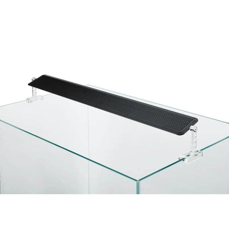 Black aquarium lid support with clear brackets on a glass tank, designed for optimal light performance and plant health.