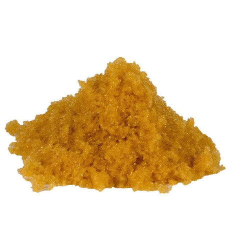 Pile of yellow deionization resin granules for water purification systems.