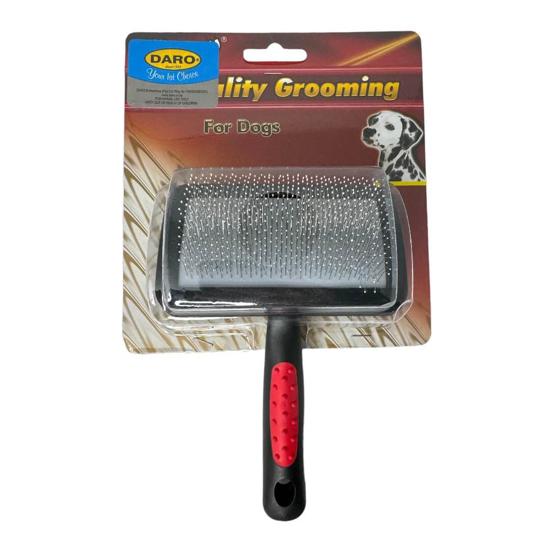 Dog curved slicker brush in packaging, designed for gentle grooming and untangling pet coats.