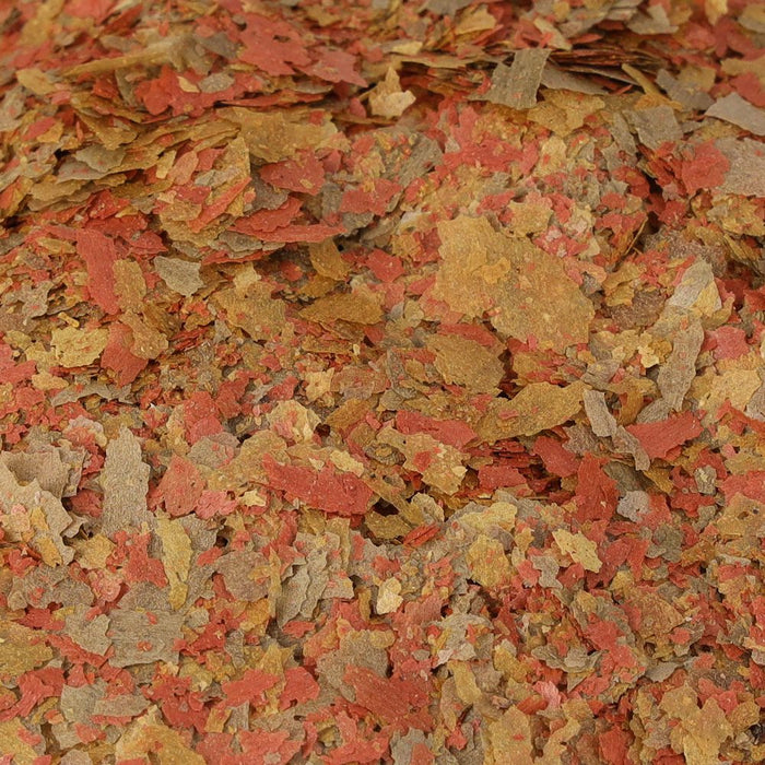 Close-up of Fish Science Tropical Flakes, showcasing nutrient-rich, colorful flakes for healthy aquatic feeding.