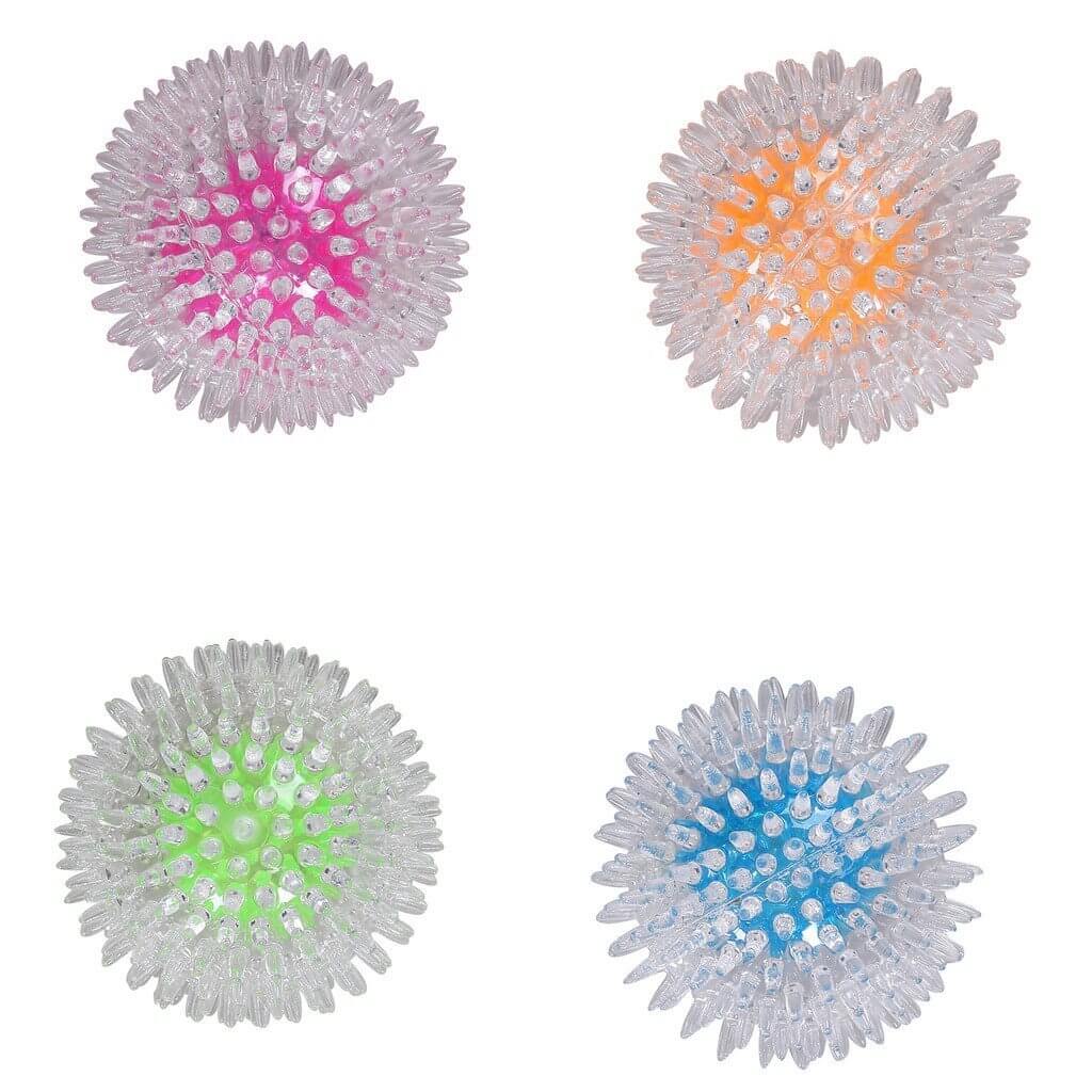 Colorful Pawise Flash Bouncer Balls in pink, orange, green, and blue, designed for safe dog play and interactive fun.