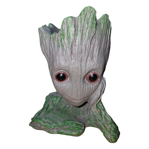 Groot flower pot head ornament ideal for succulents, flowers, or as a cute pen holder, size 11x8x13cm.