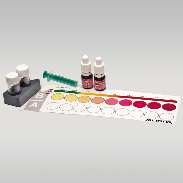 JBL Nitrite Test Kit NO2 components including color chart, vials, and reagents for accurate water testing in aquariums.