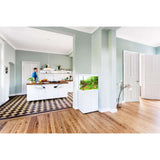 Modern living space featuring Juwel Lido Aquarium in stylish cabinet beside elegant kitchen decor.