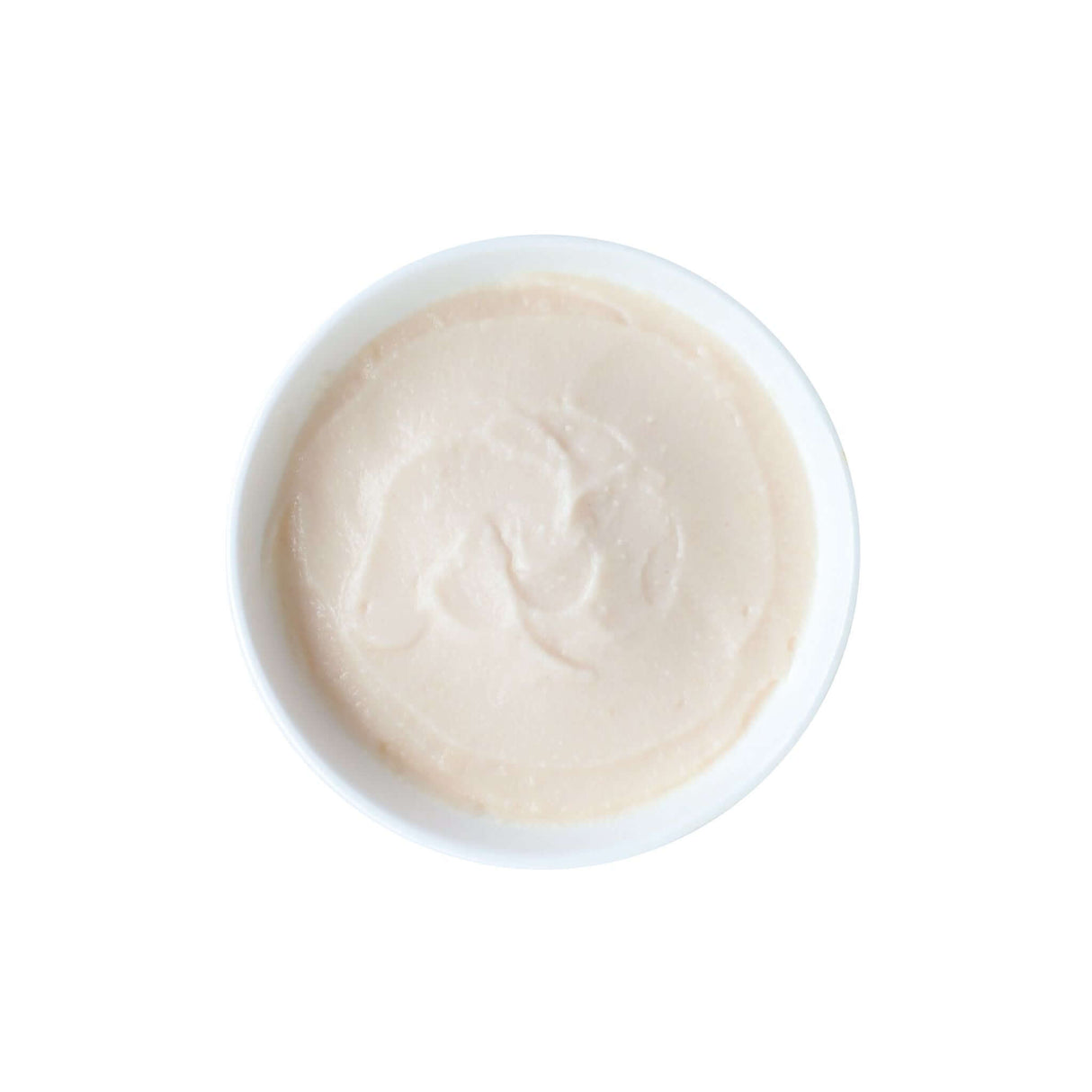 Smooth texture of Kit Cat Purr Puree Plus+ Chicken & Cranberry in a white bowl, ideal for urinary care in cats.