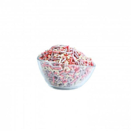 Bowl filled with colorful Kit Cat Soya Clumping Cat Litter, showcasing eco-friendly cat litter innovation.