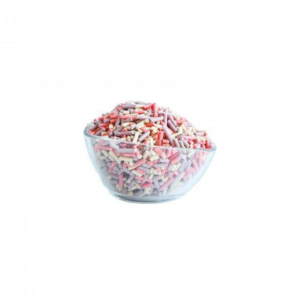 Bowl filled with colorful Kit Cat Soya Clumping Cat Litter, showcasing eco-friendly cat litter innovation.
