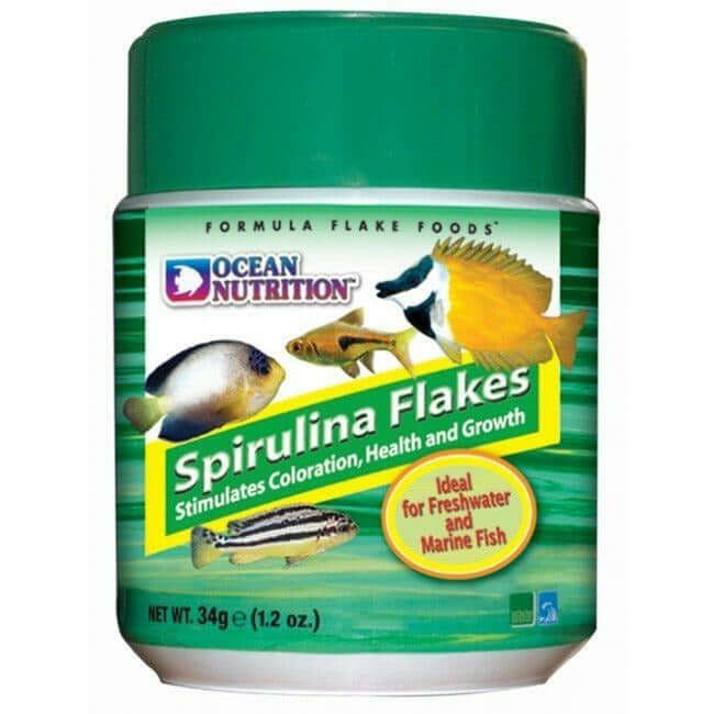 Ocean Nutrition Spirulina Flake packaging for freshwater and marine fish, promoting health and color enhancement.