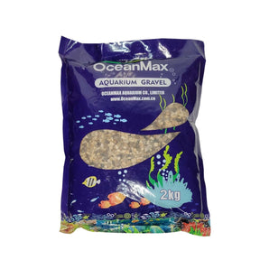 OceanMax aquarium gravel 2kg bag, ideal for creating a natural substrate in aquariums. Promotes healthy aquatic environments.