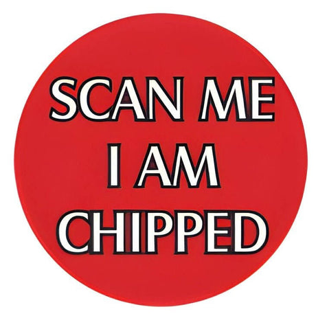 Red pet ID tag with text "SCAN ME I AM CHIPPED" for easy identification of microchipped pets.