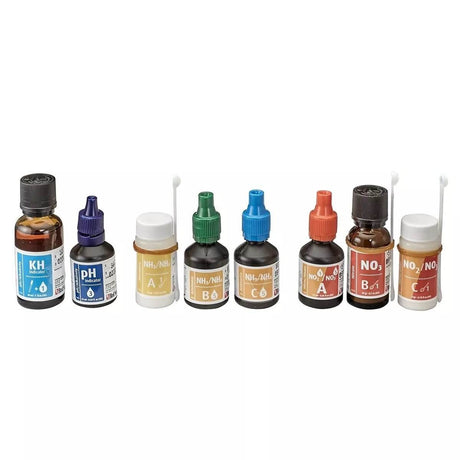 Red Sea Marine Care Test Kit bottles for pH, alkalinity, ammonia, nitrite, and nitrate testing in marine aquariums.