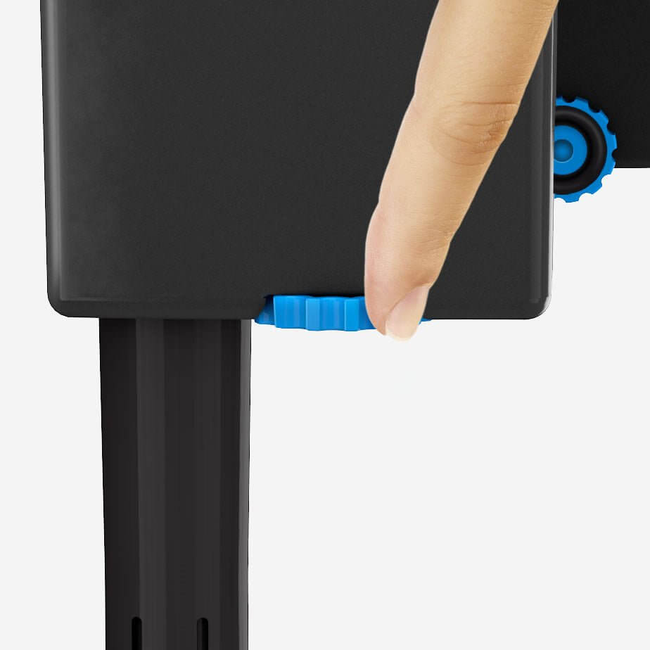 Hand adjusting the control knob on a Seachem Tidal Power Hang-On Filter for easy water flow management.