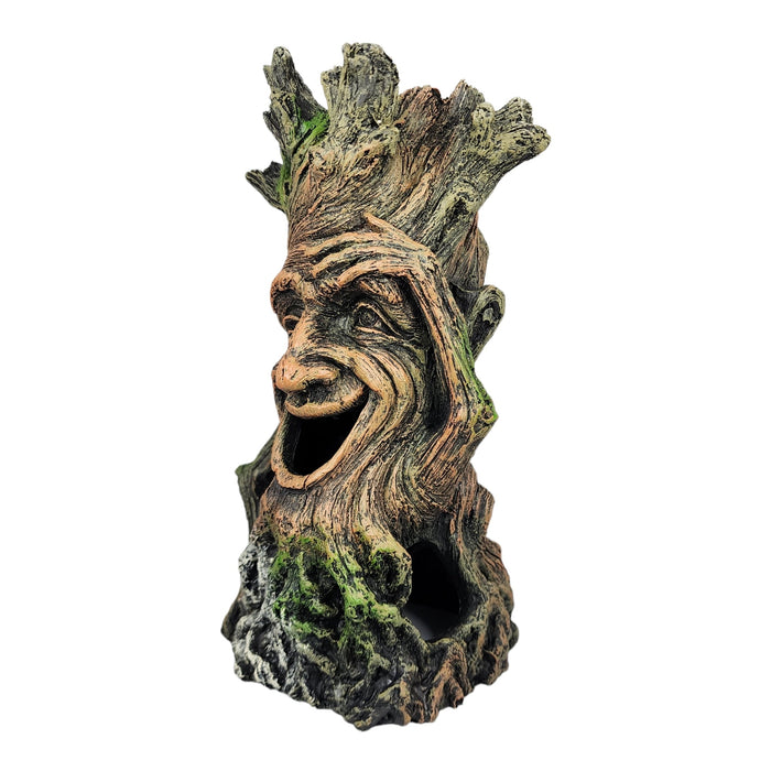 Smiling tree stump aquarium ornament adding whimsy and charm to aquatic environments.